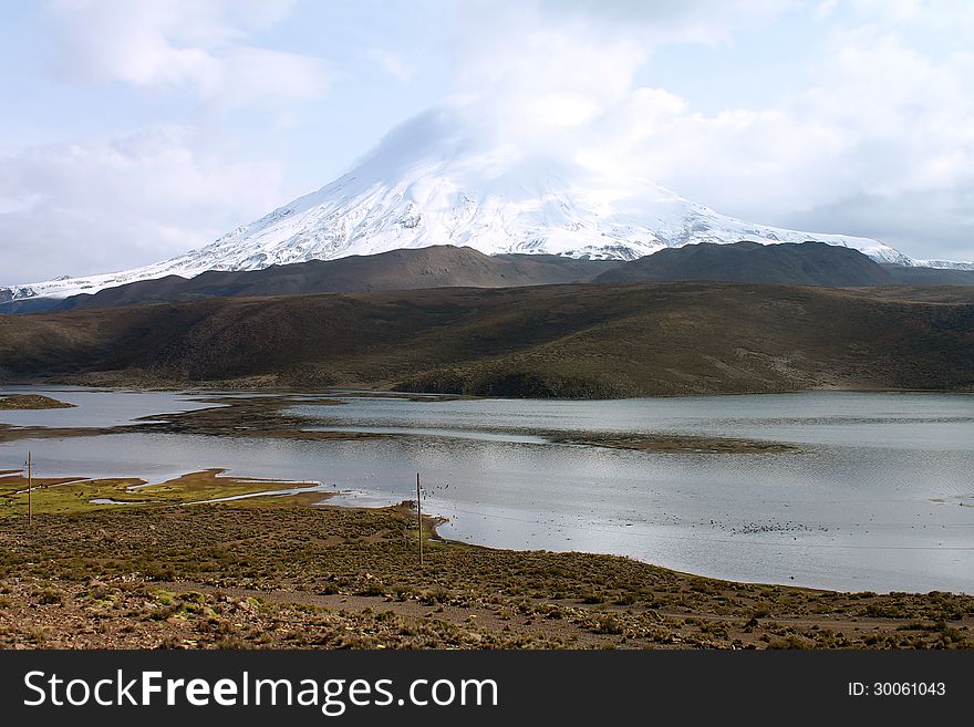 Parinacota volcano with its 6,342 meters of altitude is located at northern Chile, near the border of Bolivia. Parinacota volcano with its 6,342 meters of altitude is located at northern Chile, near the border of Bolivia.