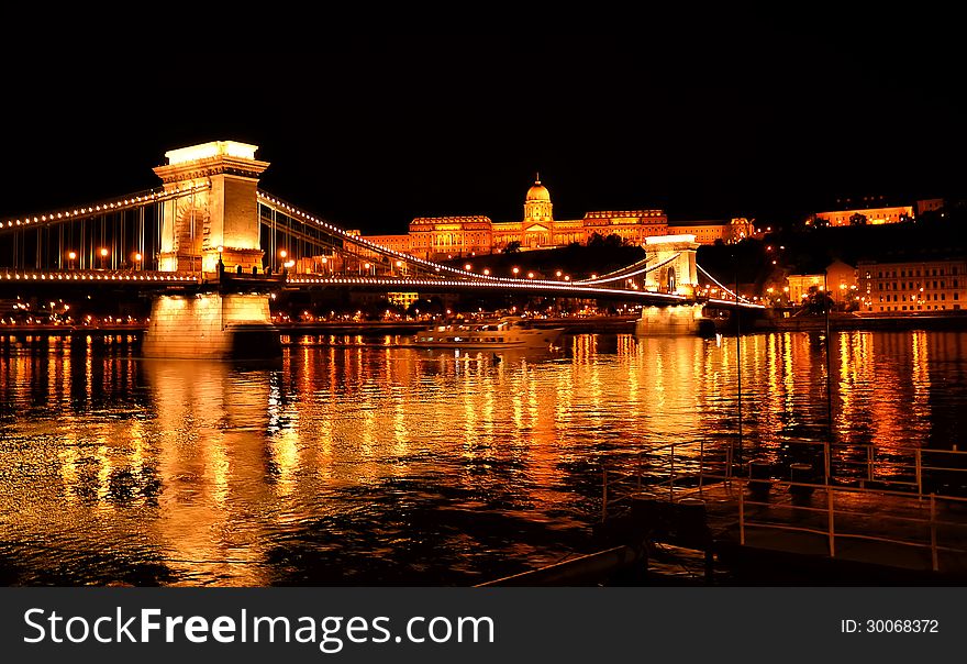 Gorgeously lit Elisabeth bridge under the dark silent sky at midnight in Budapest. Gorgeously lit Elisabeth bridge under the dark silent sky at midnight in Budapest.