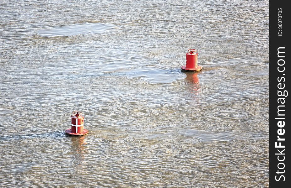 Red buoys on the river. Red buoys on the river.