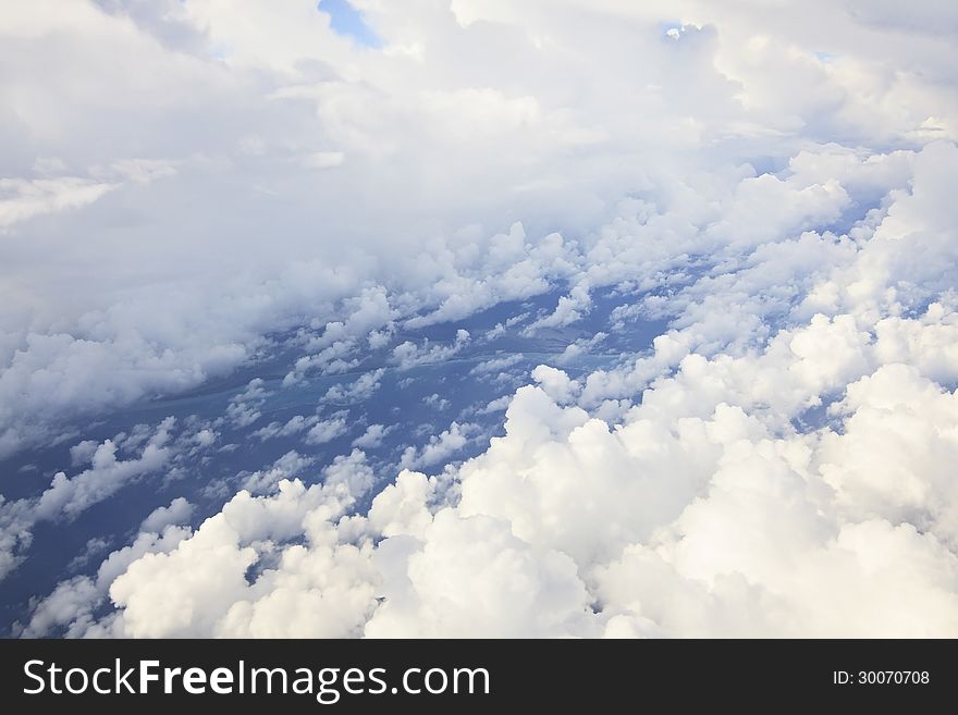 Cumulus clouds over the Atlantic Ocean (type of aircraft). Cuba.