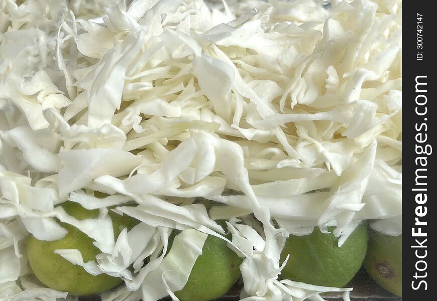 Slices of white cauliflower as a design background