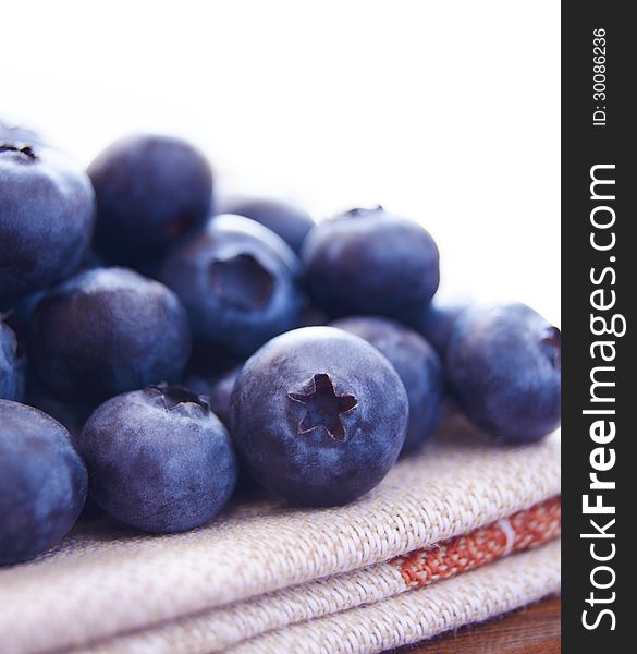 Closeup Image Of Blueberries On The Fabric Serviette