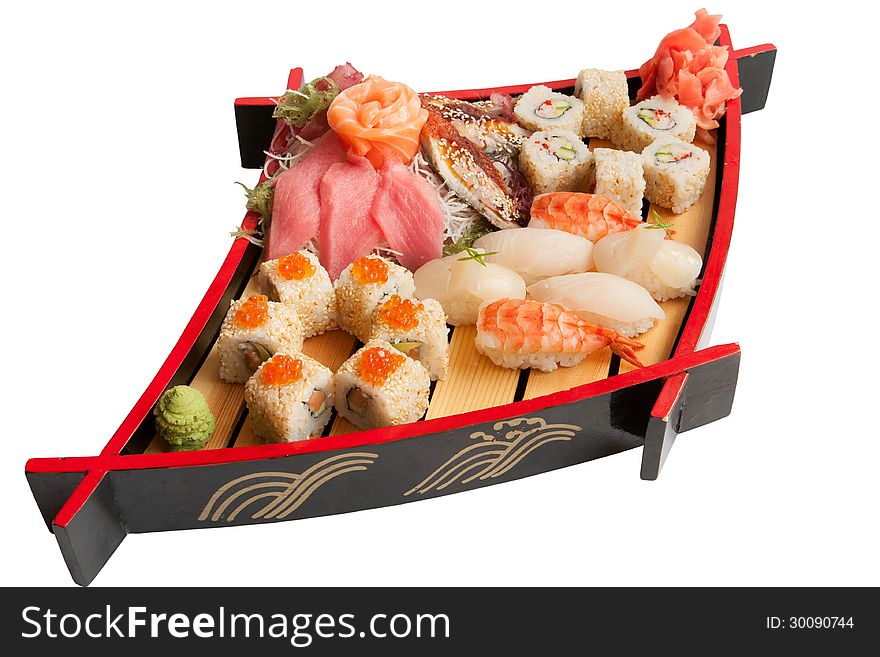 Set of sushi on a wooden plate. Set of sushi on a wooden plate