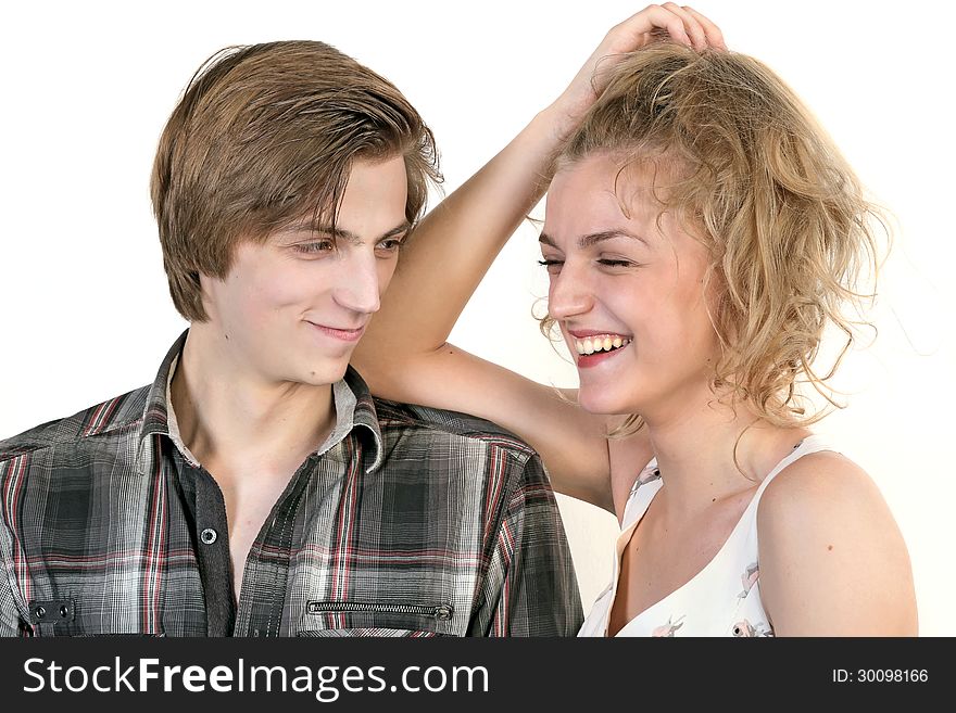 Portrait of young happy caucasian couple. Isolated on white background. Portrait of young happy caucasian couple. Isolated on white background