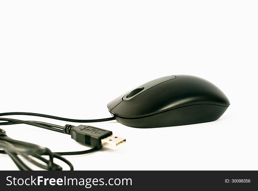 Black Computer Mouse with USB cord isolated on white.