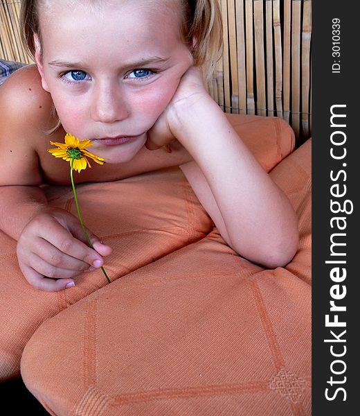 The child with a flower.