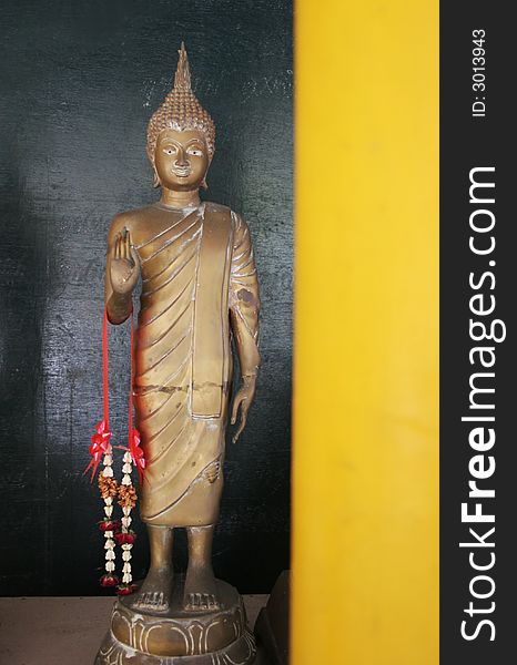 Buddhist statue at a temple on Koh Samet, Thailand - travel and tourism.