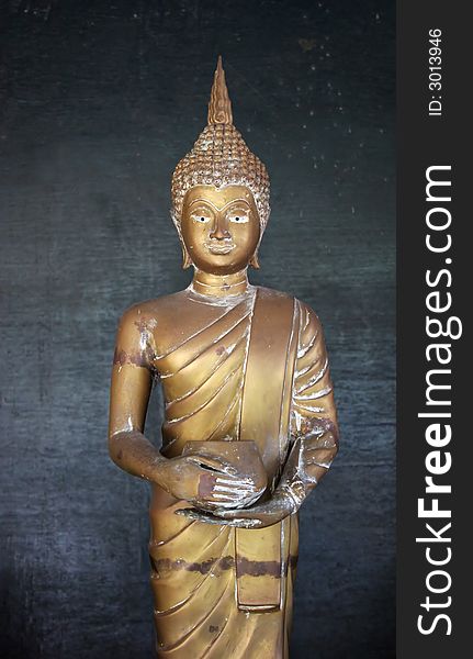 Buddhist statue at a temple on Koh Samet, Thailand - travel and tourism.