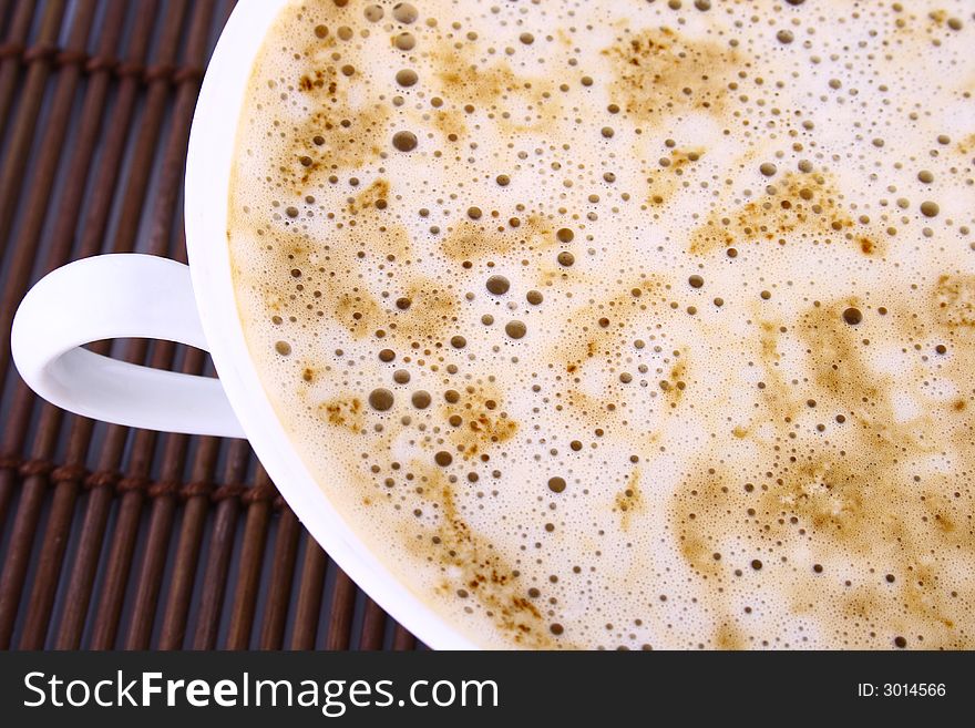 Cup of coffee with chocolate Frothy cappuccino coffee.