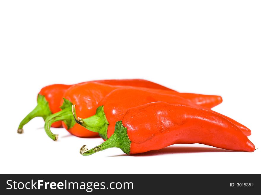 Red hot jalapeno pepper over white background