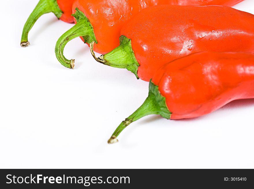 Red hot jalapeno pepper over white background