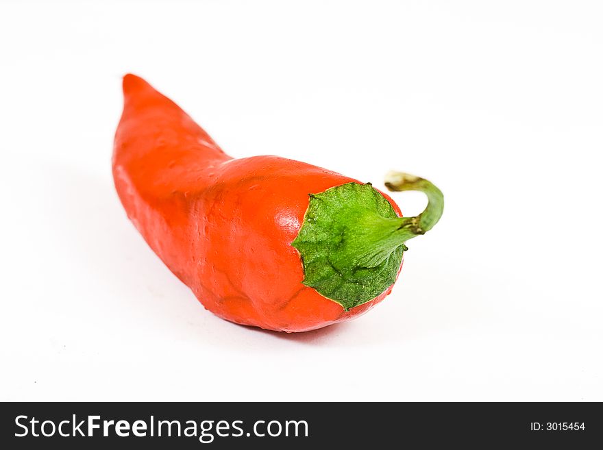 Red hot jalapeno pepper over white background