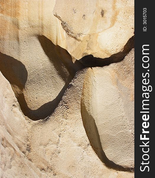 Rocky man, sun and shadow, face