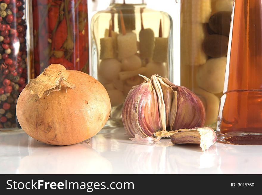 Jars of Spices and Garlic and onion