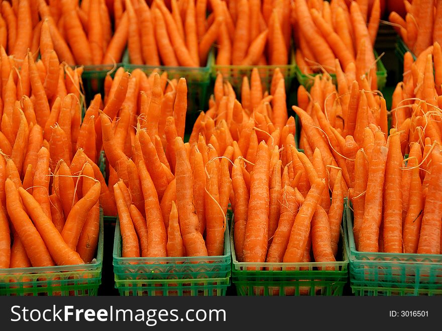 A display of carrots at an outdoor market in Ottawa, Canada. A display of carrots at an outdoor market in Ottawa, Canada