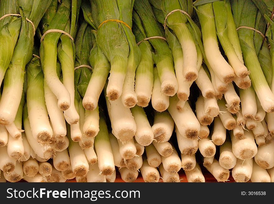 A display of green onions at an outdoor market in Ottawa, Canada