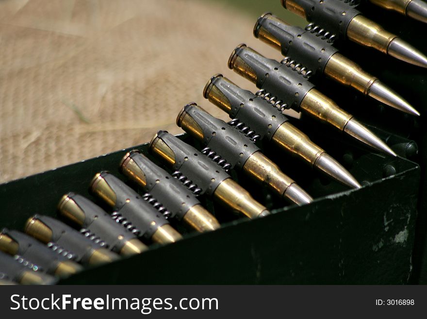 Cartridges for a handgun laying on the cloth