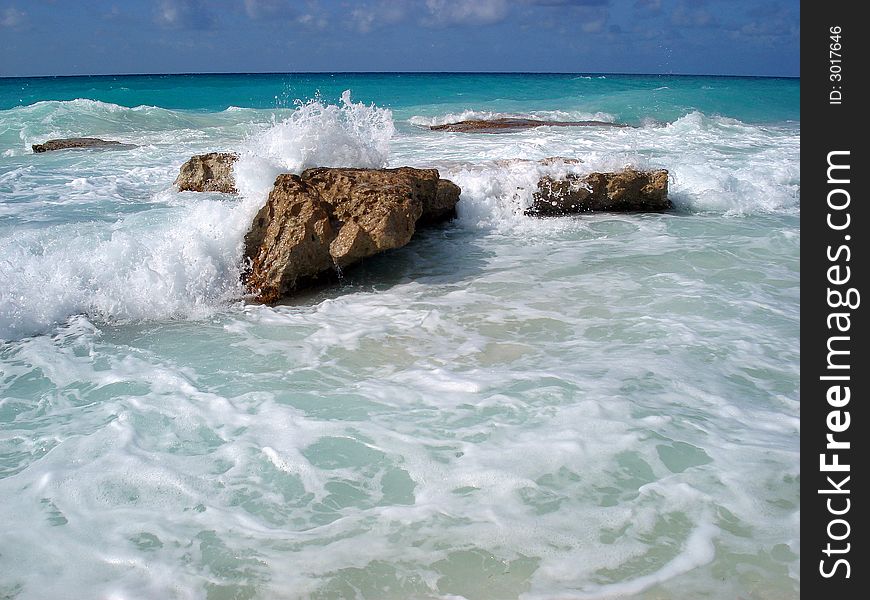 Wave Splashing Rocks