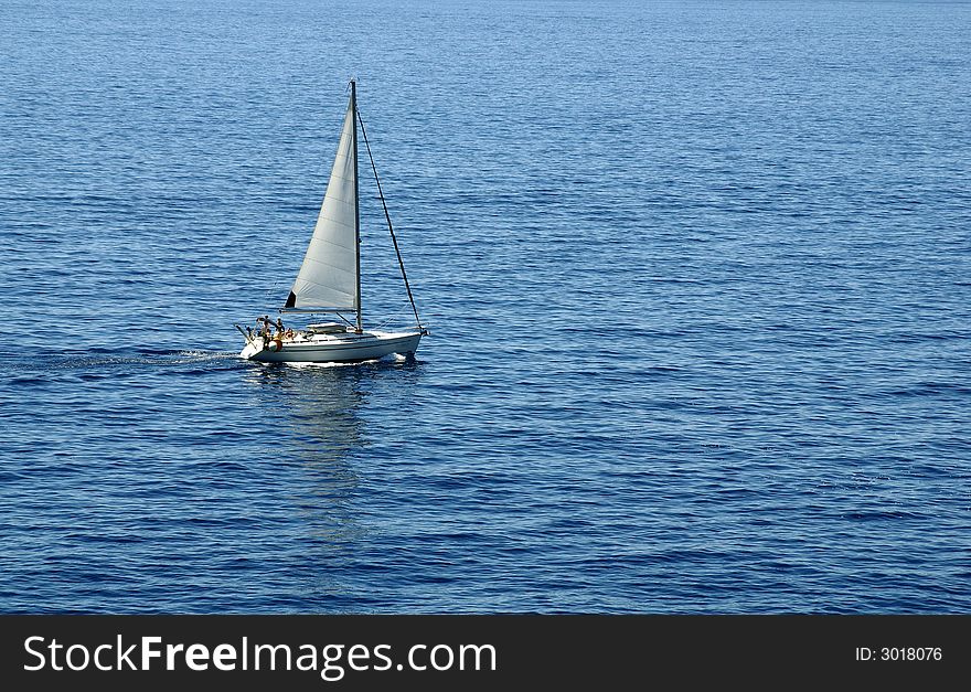 Yacht on Ligurian Sea - the Mediterranean - near coast line, Cinque Terre National Park, Italy. Yacht on Ligurian Sea - the Mediterranean - near coast line, Cinque Terre National Park, Italy.