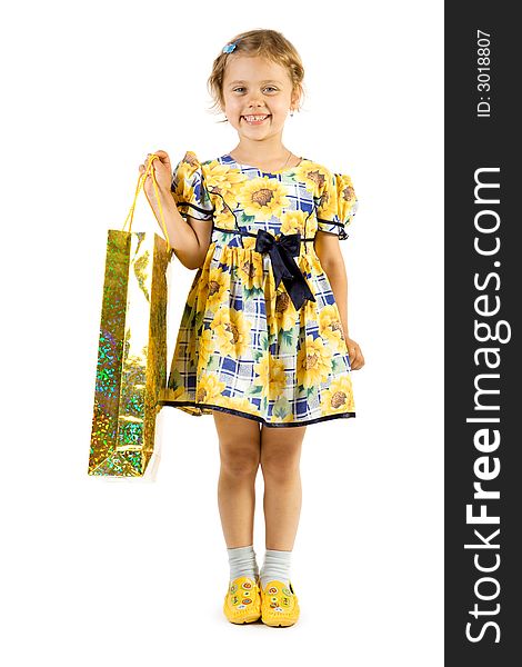 Little smiling girl with shopping bag. Isolate on white background.