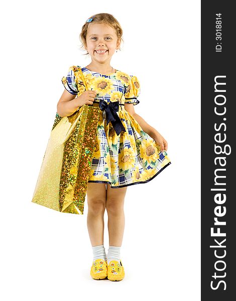 Little smiling girl with shopping bag. Isolate on white background.