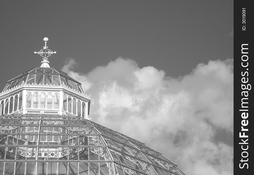 Top of the victorian Palm House in Sefton Park, Liverpool with sunlight reflected off the metalwork. Top of the victorian Palm House in Sefton Park, Liverpool with sunlight reflected off the metalwork.