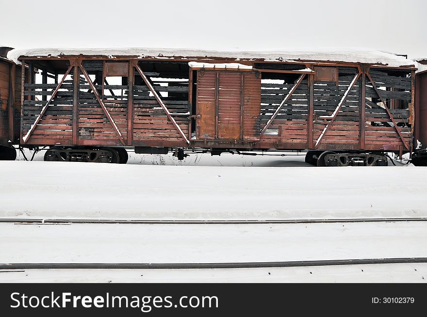 Burnt car of the train on white snow. Burnt car of the train on white snow.