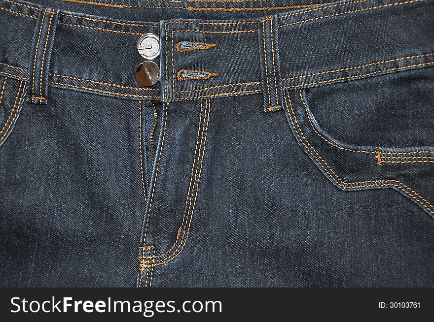 Background of blue jeans with buttons undone. Background of blue jeans with buttons undone.