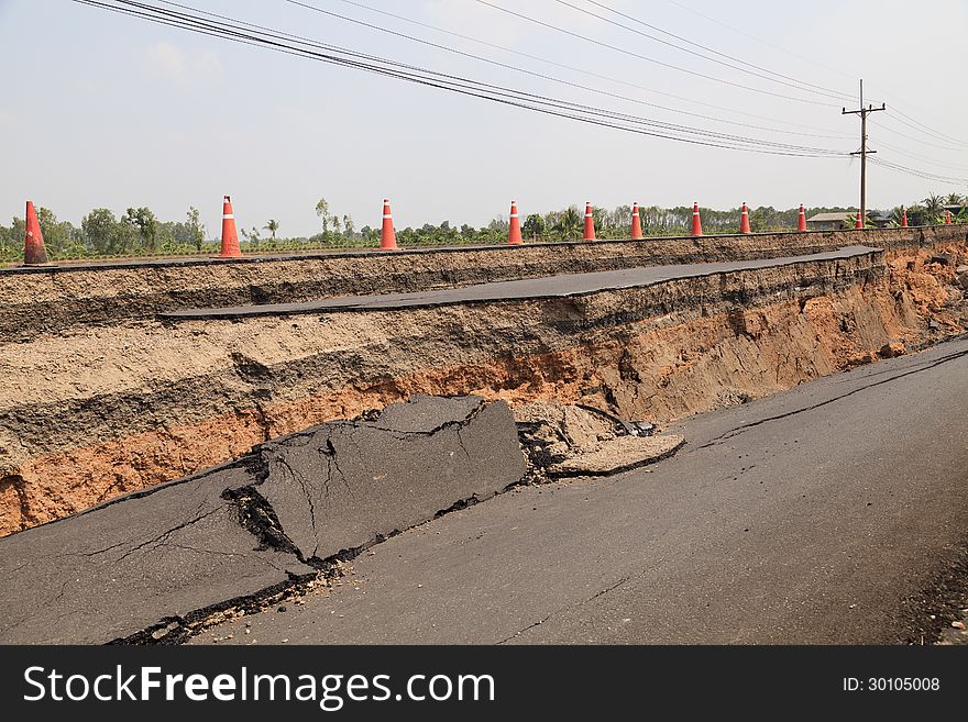Cracked asphalt road, Dangers natural disasters