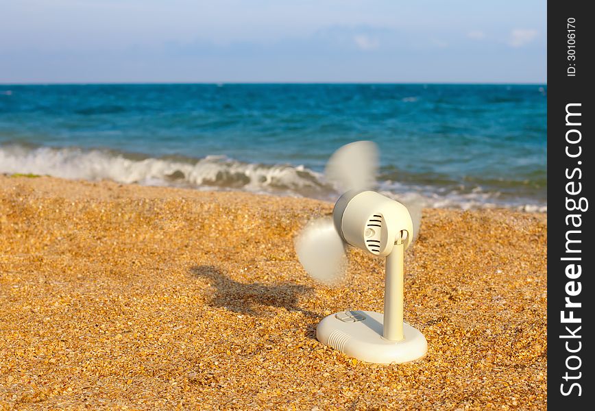 A fan on the beach. A fan on the beach
