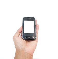 Hand Holding Mobile Smart Phone With Blank Screen. Stock Photography