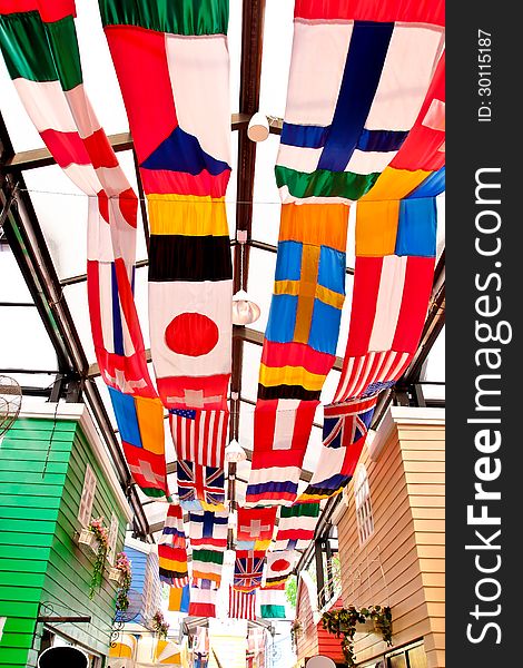 Flag of different countries.Decoration in the building. Flag of different countries.Decoration in the building