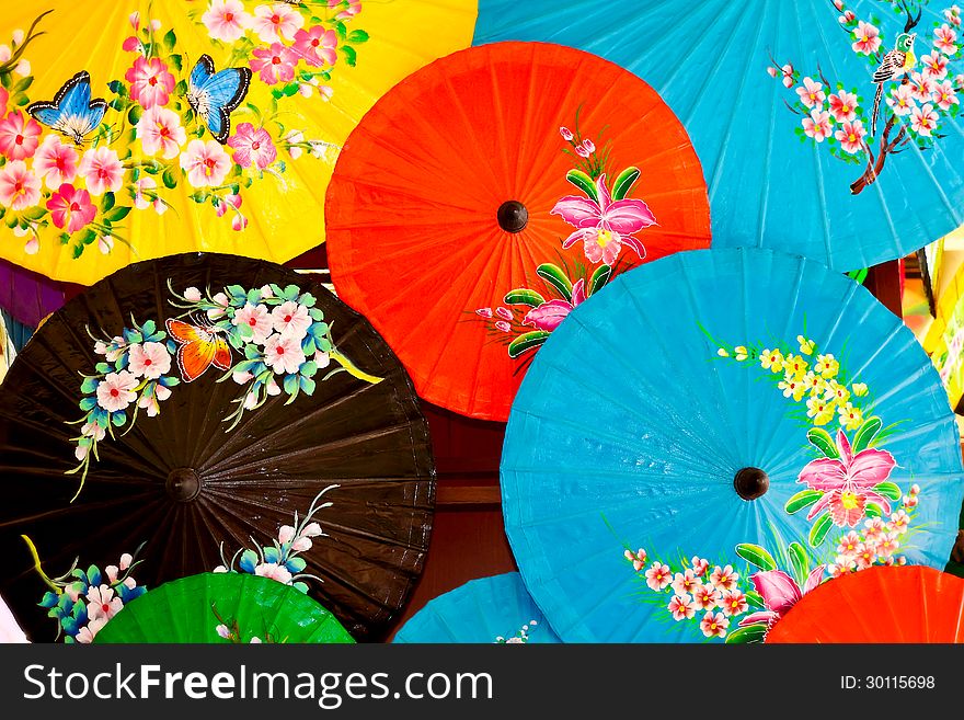 Colorful umbrellas with painting by water colors