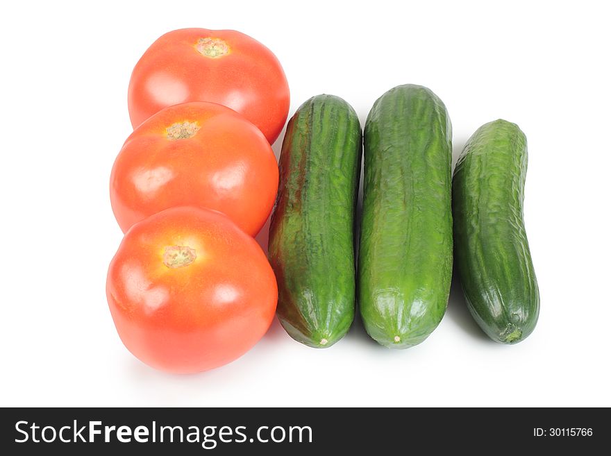 Color photo of big red tomatos and cucumber. Color photo of big red tomatos and cucumber