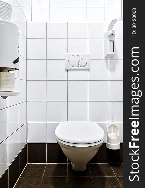 A clean and white toilet.