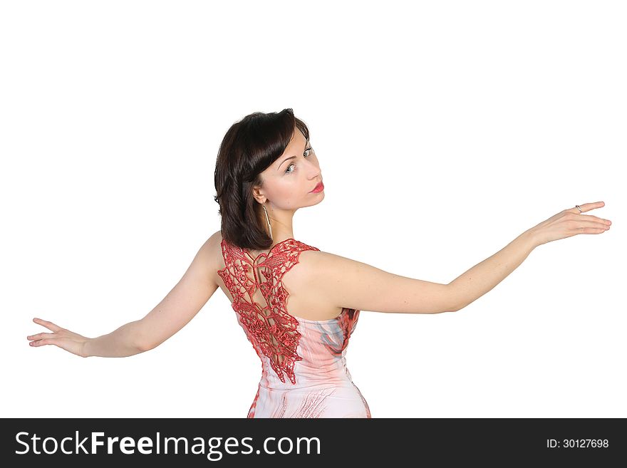 Portrait of a young attractive girl with raised open hands on white background. Place for text design. Portrait of a young attractive girl with raised open hands on white background. Place for text design.