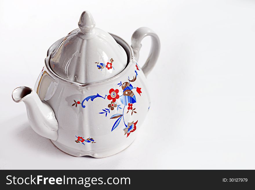 Vintage china teapot on white background