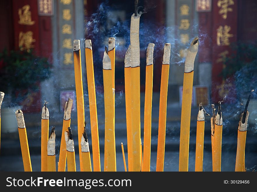 Buddhist prayer joss sticks in a chinese temple