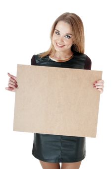 Beautiful Smiling Girl Showing Empty Wooden Notice Board. Royalty Free Stock Photography Beautiful Smiling Girl Showing Empty Wooden Notice Board. Royalty Free Stock Photography