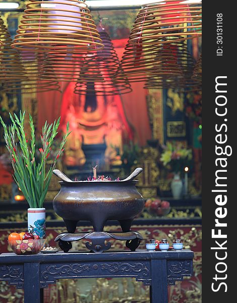 Buddhist prayer joss sticks in a chinese temple