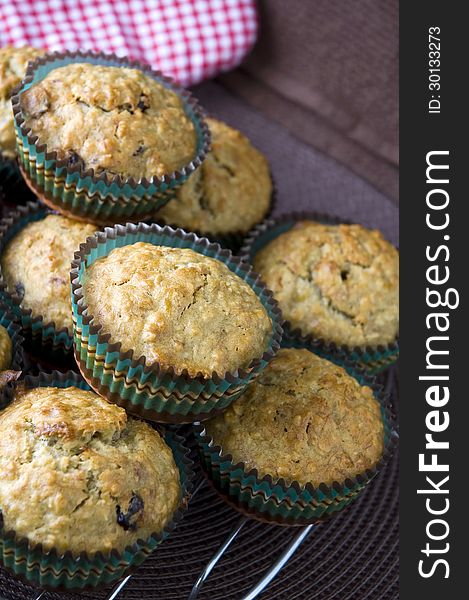 Pile of banana cupcakes on cooling rack