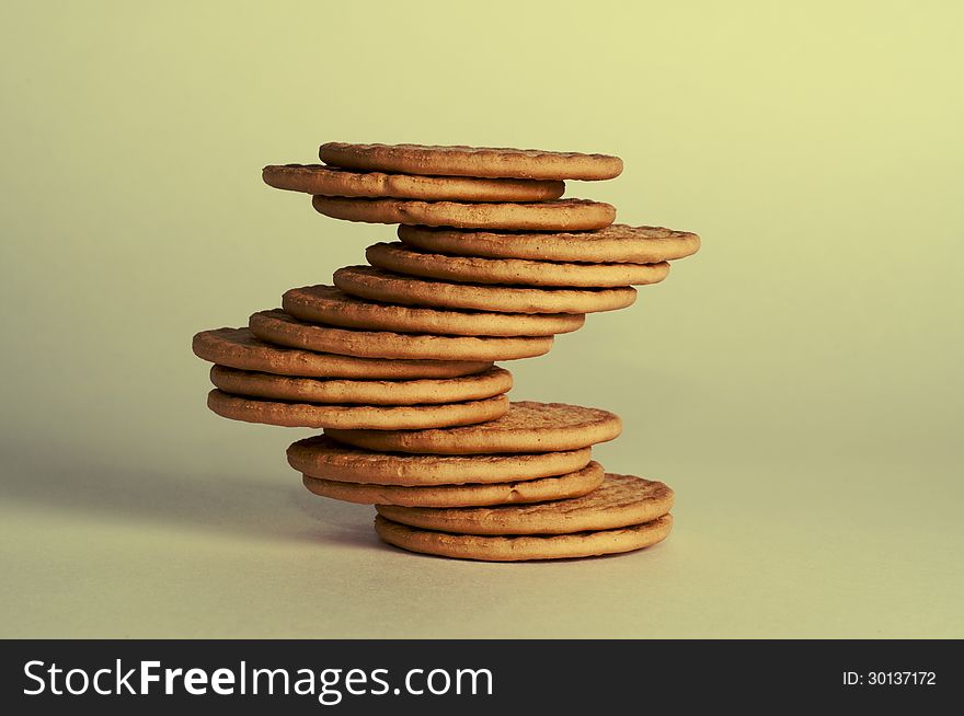 Pile of cookies on a beige background