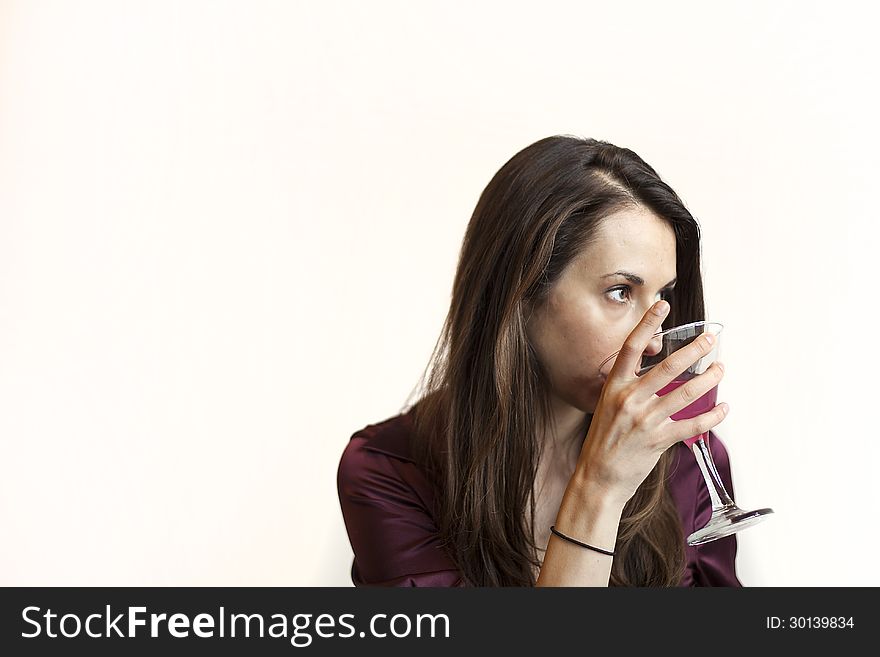 Beautiful Young Woman Holding a Pink Martini