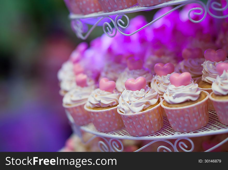 Wedding pink cupcakes with heart