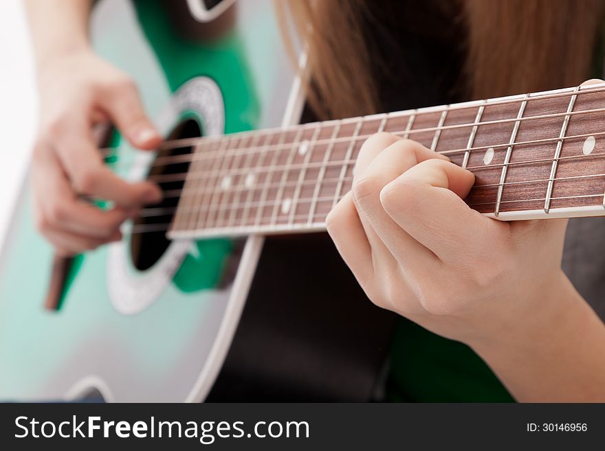 Beautiful Girl With Guitar  On White Background