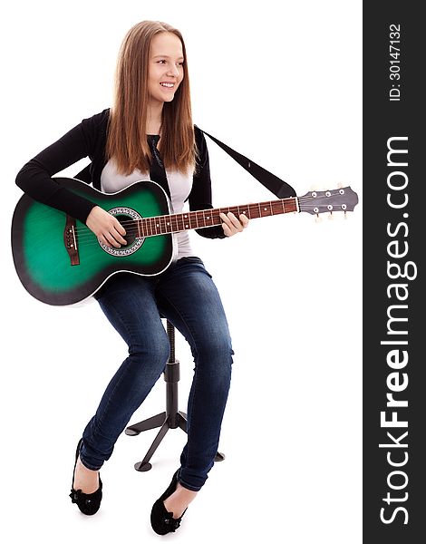 Young beauty music girl with guitar on white background. Young beauty music girl with guitar on white background