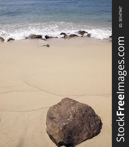 Large stone lying on the beach. Large stone lying on the beach