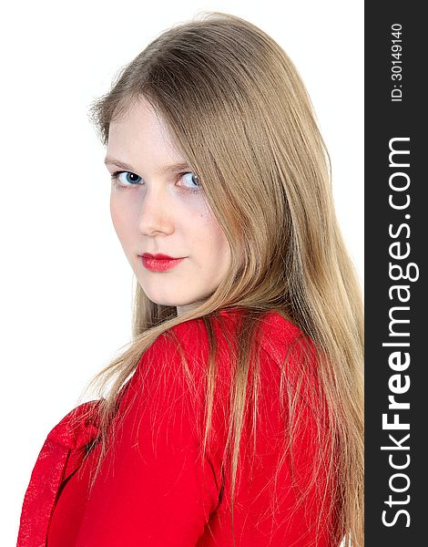 Close up studio portrait of beautiful young woman in red