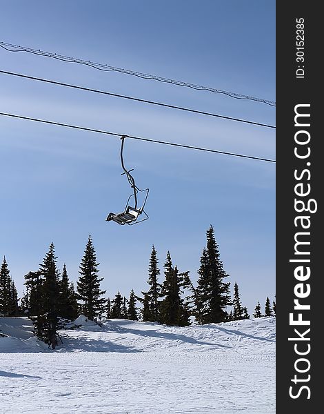 Chairlift in the mountains in ski resort