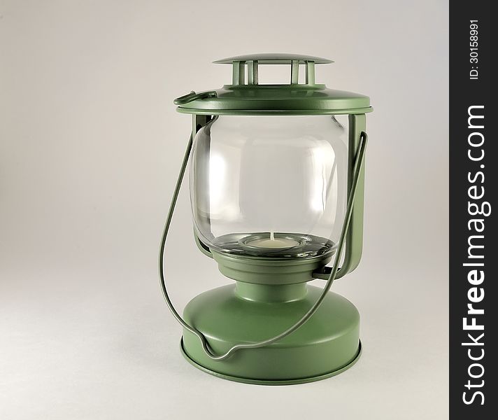Portable lamp with a candle